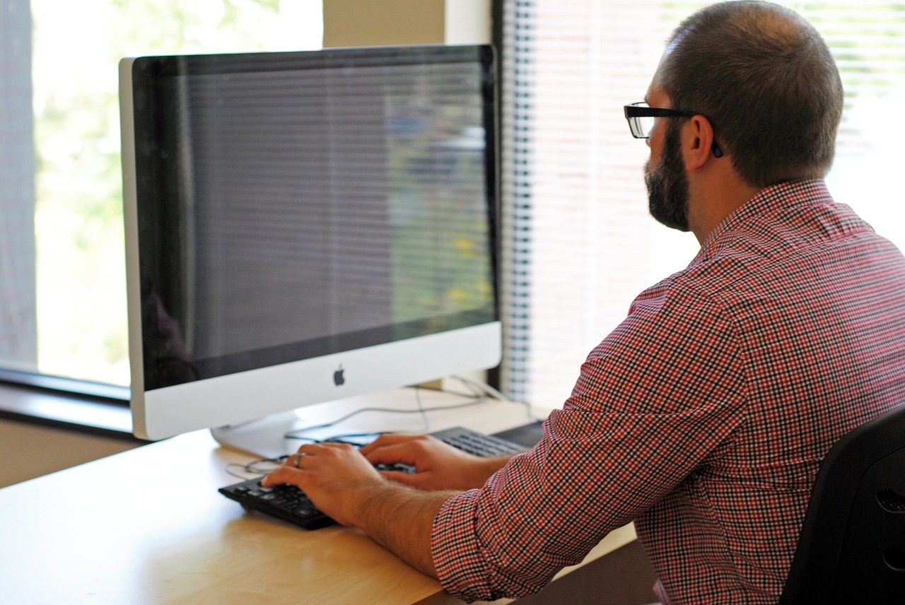 man learning online